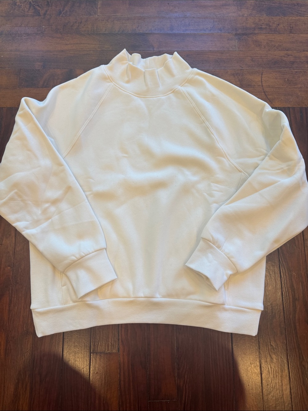 COMFRT mock neck pullover in Shell